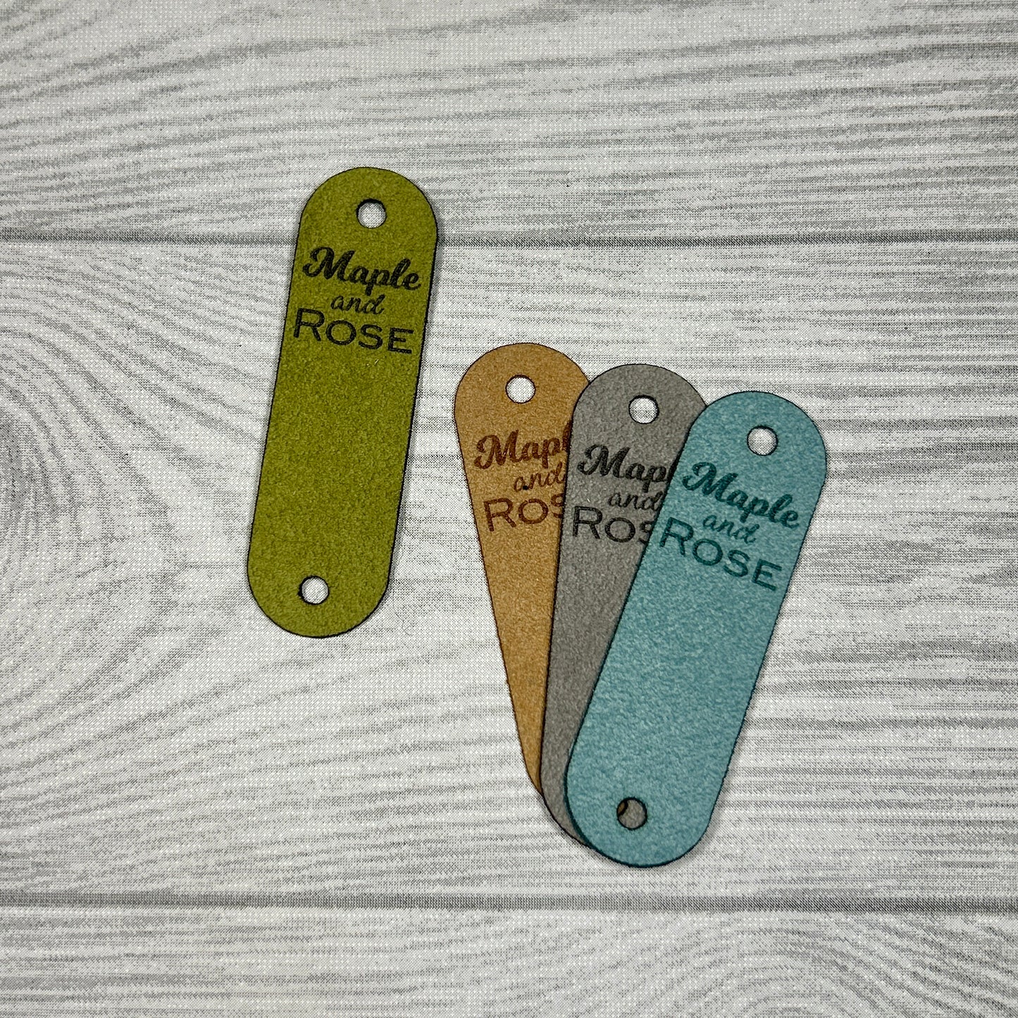 Suede Double Cap Fold Over Tags