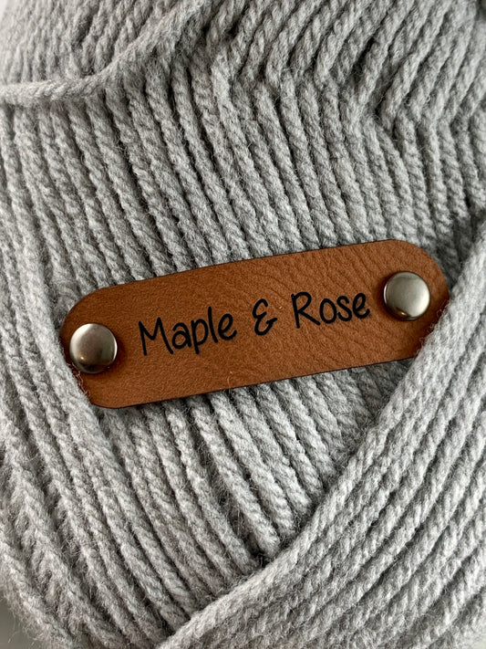 Double Cap Rivet Leatherette Tags - Flat Lay