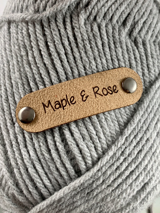 Double Cap Rivet Suede Tags - Flat Lay